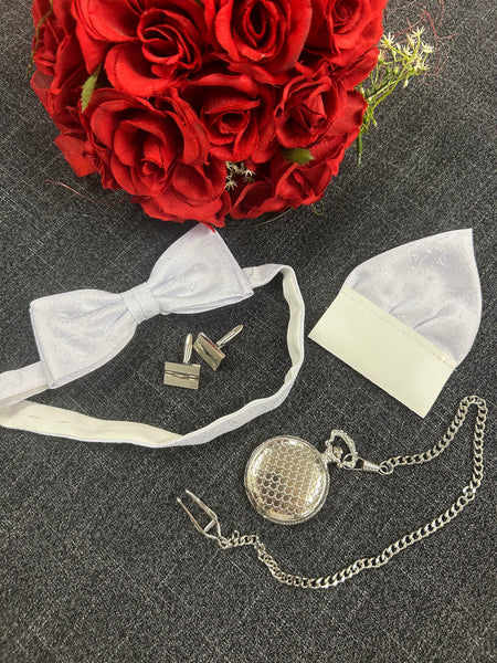 Vintage Herren Accessoires: Fliege, Einstecktuch, Manschettenknöpfe und Taschenuhr auf grauem Stoff
