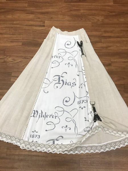 Trachtenrock Alphorn Gr. 34, Beige, mit Spitze und Schrift-Einsatz.