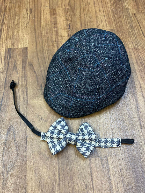Schiebermütze und Fliege als Vintage Accessoires zum 20er Jahre Herren Outfit