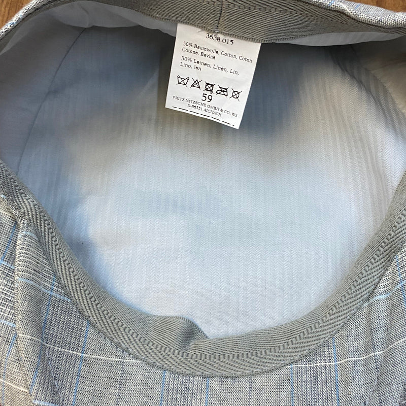 Schiebermütze als Accessoires für Vintage Herren Outfit