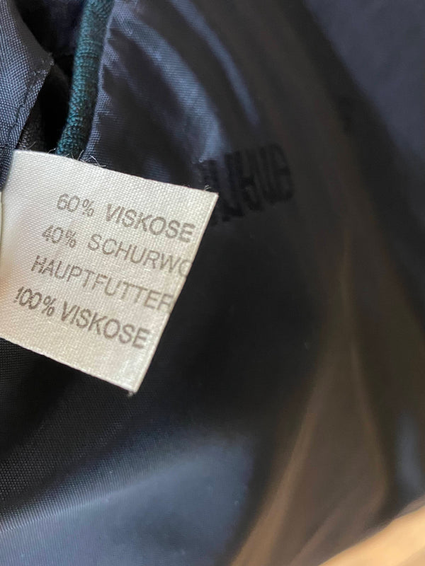 Materialetikett des Sakkos mit Viskose- und Schurwollanteil