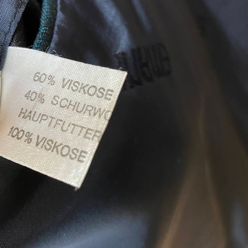 Materialetikett des Sakkos mit Viskose- und Schurwollanteil