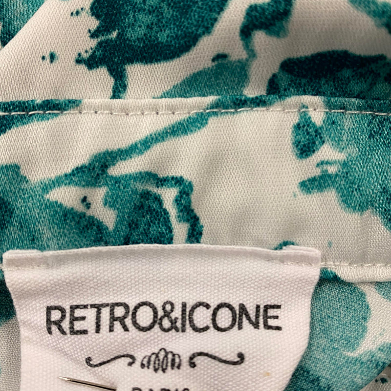 „Etikett Retro & Icone Paris in grün-weißem Vintage Tageskleid im 1920er Stil“