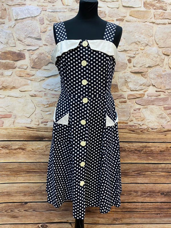 „Schwarz weißes 50er Jahre Kleid mit Punkten in Größe 40, breiten Trägern und cremefarbenen Details“