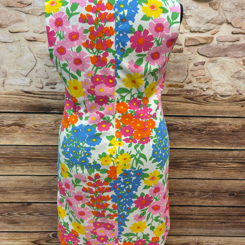 „60er Jahre Kleid als Vintage Unikat mit buntem Blumenmuster im Flower Power Stil für Damen Größe 50, Rückansicht“