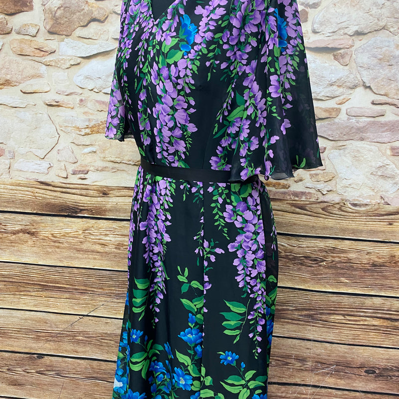 Ein langes Hippie Kleid aus den 70er Jahre i