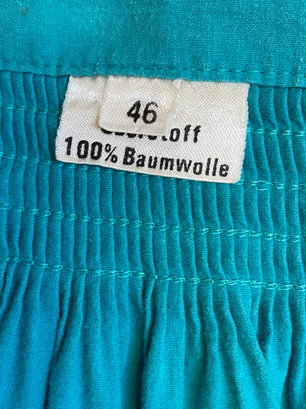 Vintage Dirndlschürze – petrol/türkis, lang mit Smokbund