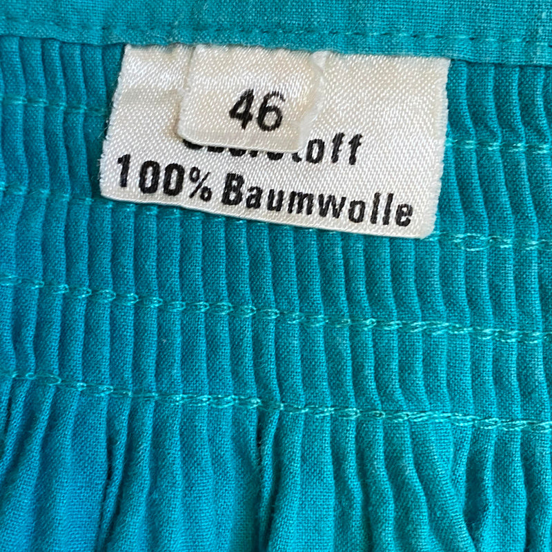 Vintage Dirndlschürze – petrol/türkis, lang mit Smokbund