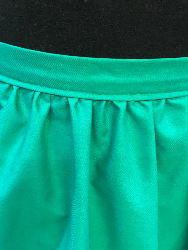 Vintage Dirndlschürze – sattes Grün