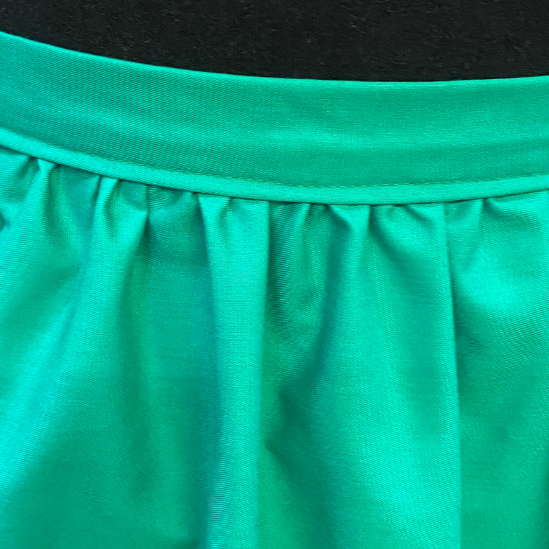Vintage Dirndlschürze – sattes Grün