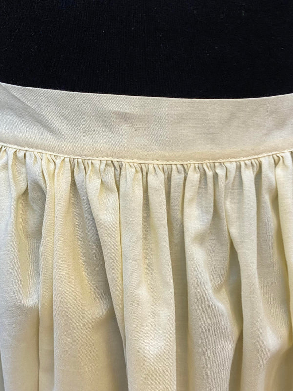 Vintage Dirndlschürze – creme mit Spitzenborten