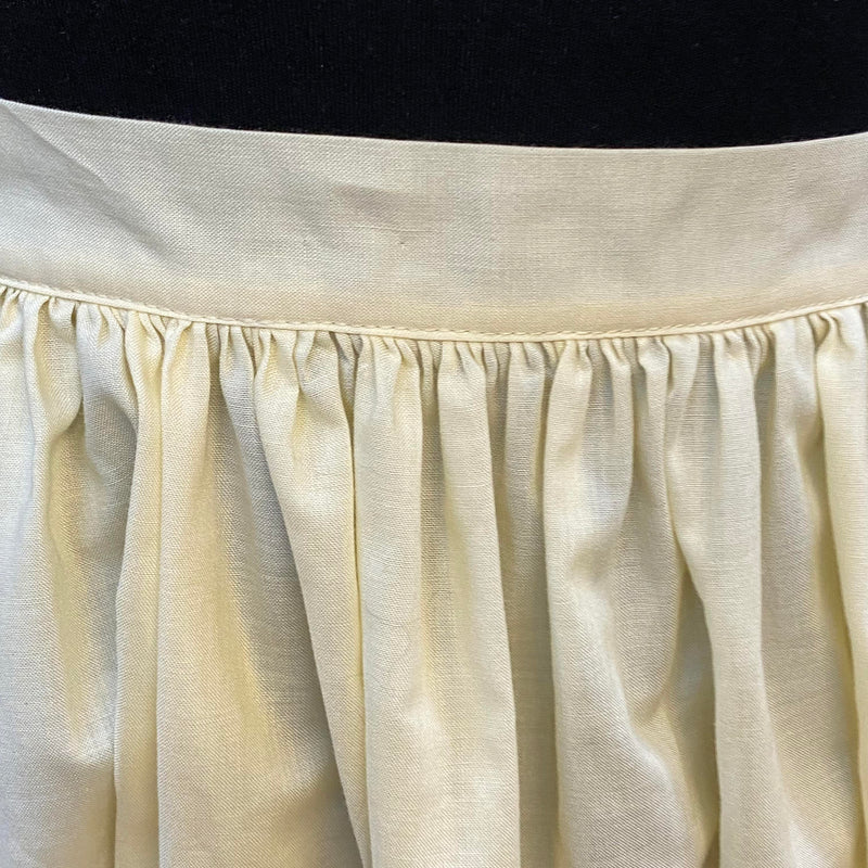 Vintage Dirndlschürze – creme mit Spitzenborten