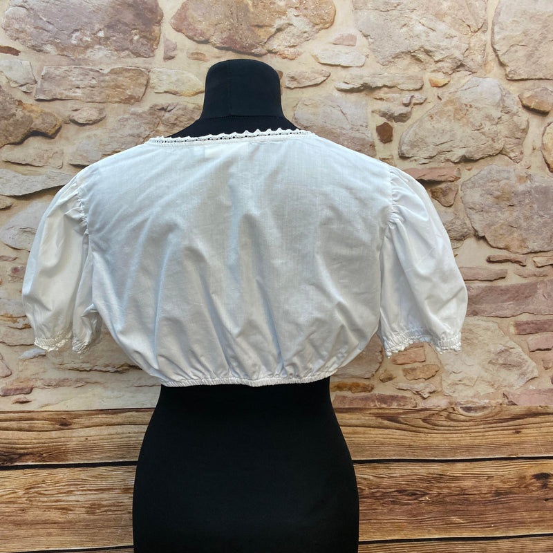 Dirndlbluse von Stockerpoint in Weiß – Gr. 44, neuwertig