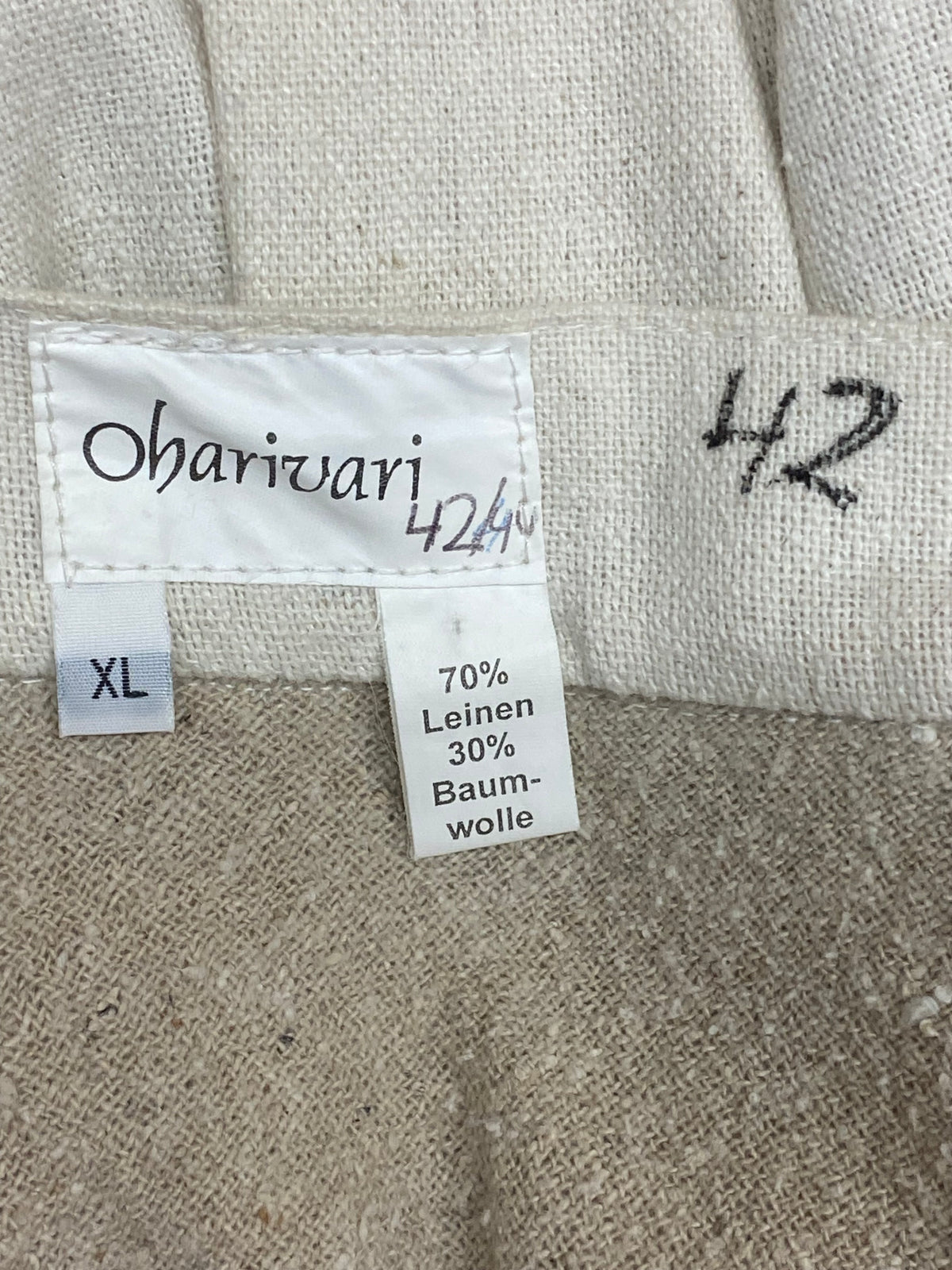 Jupe courte traditionnelle de la marque Oharivari beige/crème taille 42 vintage