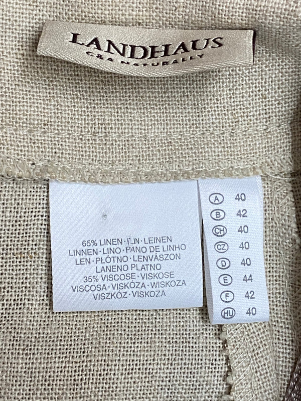 “Pflegeetikett Landhaus C&A Naturally: 65 % Leinen, 35 % Viskose, Größenangaben”