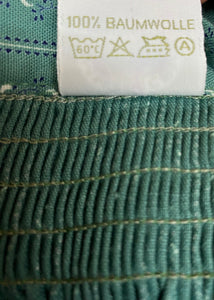 Mittellange Vintage Dirndl-Schürze für Trachtenkleid in grün gemustert 74 cm