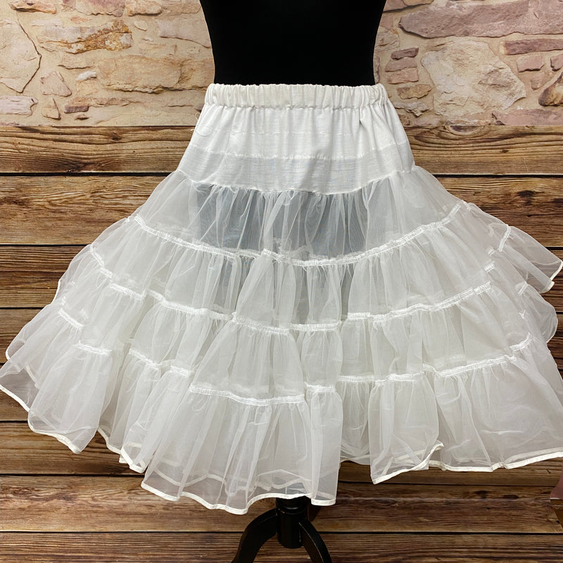 Weißer, zweilagiger Petticoat aus Polyester, 55 cm lang, Gr. 36–38, mit elastischem Gummibund, bauschig und kratzfrei.