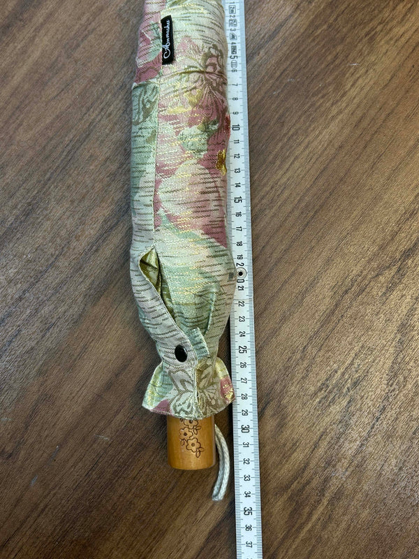 „Vintage Taschenschirm mit Maßband, Länge ca. 70 cm, florales Muster in Rosa und Grün“