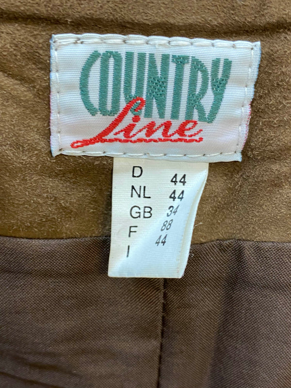 Markenetikett Country Line in einer braunen Damen Trachten-Lederhose