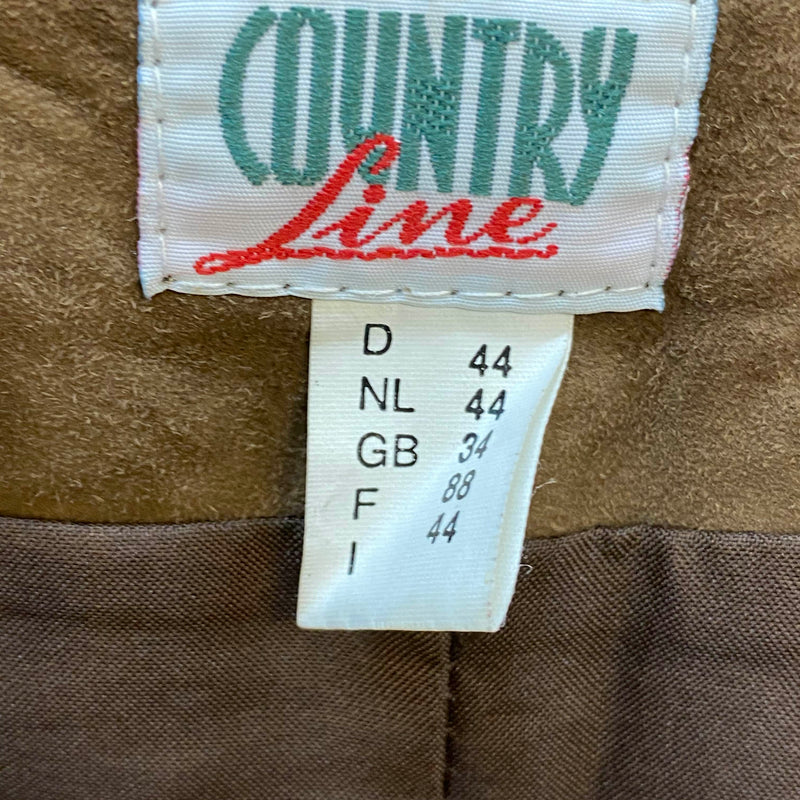 Markenetikett Country Line in einer braunen Damen Trachten-Lederhose
