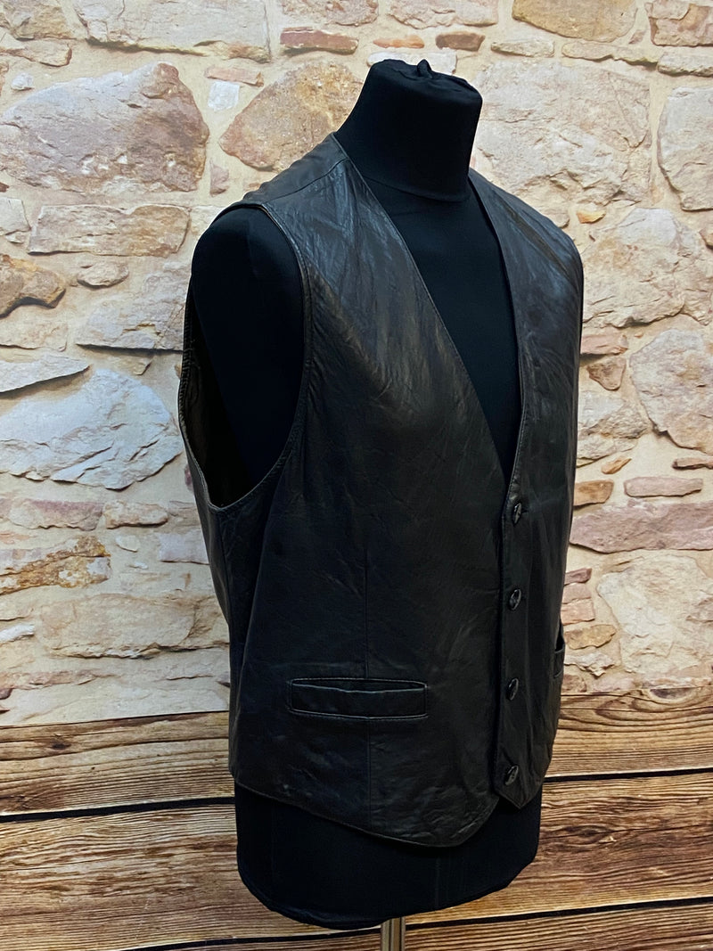 Gilet en cuir vintage noir élégant de Trapper taille L 