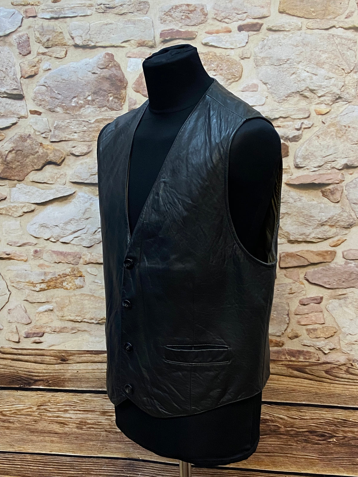 Gilet en cuir vintage noir élégant de Trapper taille L 