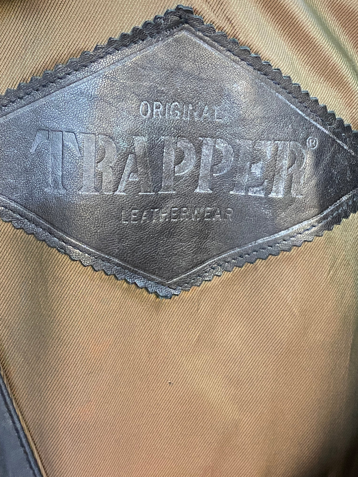 Gilet en cuir vintage noir élégant de Trapper taille L 