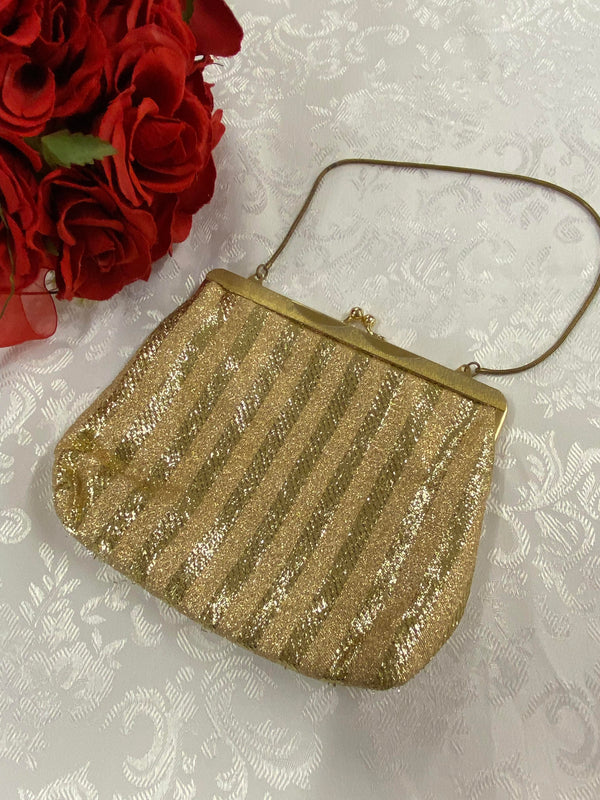 „Goldene 1960er Vintage Abendtasche mit Glitzerstoff und Metallbügelverschluss“