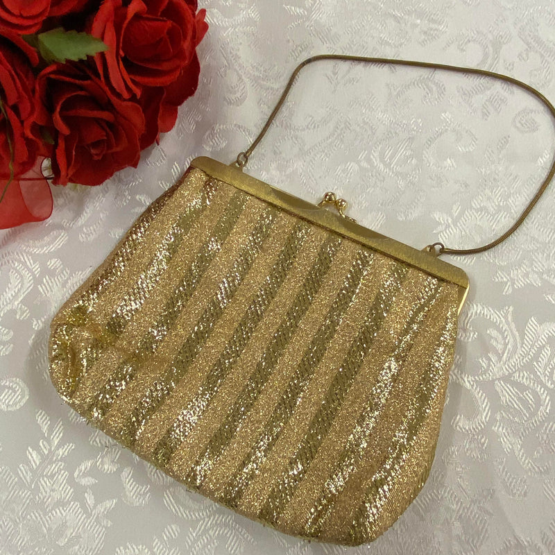 „Goldene 1960er Vintage Abendtasche mit Glitzerstoff und Metallbügelverschluss“