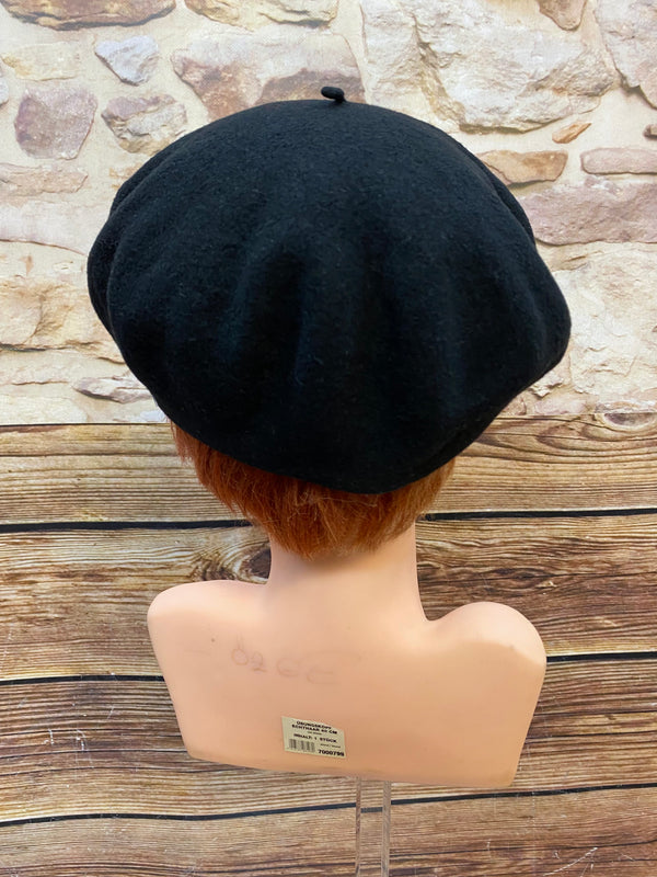 „Rückansicht von schwarzem Vintage Damen-Barett Größe 58 mit klassischer runder Barettform“
