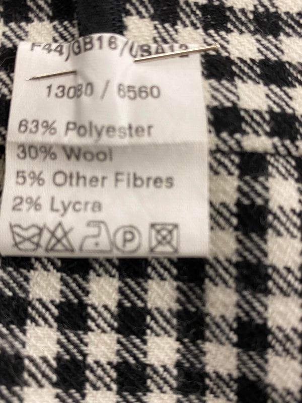 „Materialetikett der Vintage Pepitahose Damen mit Wollanteil und Lycra“