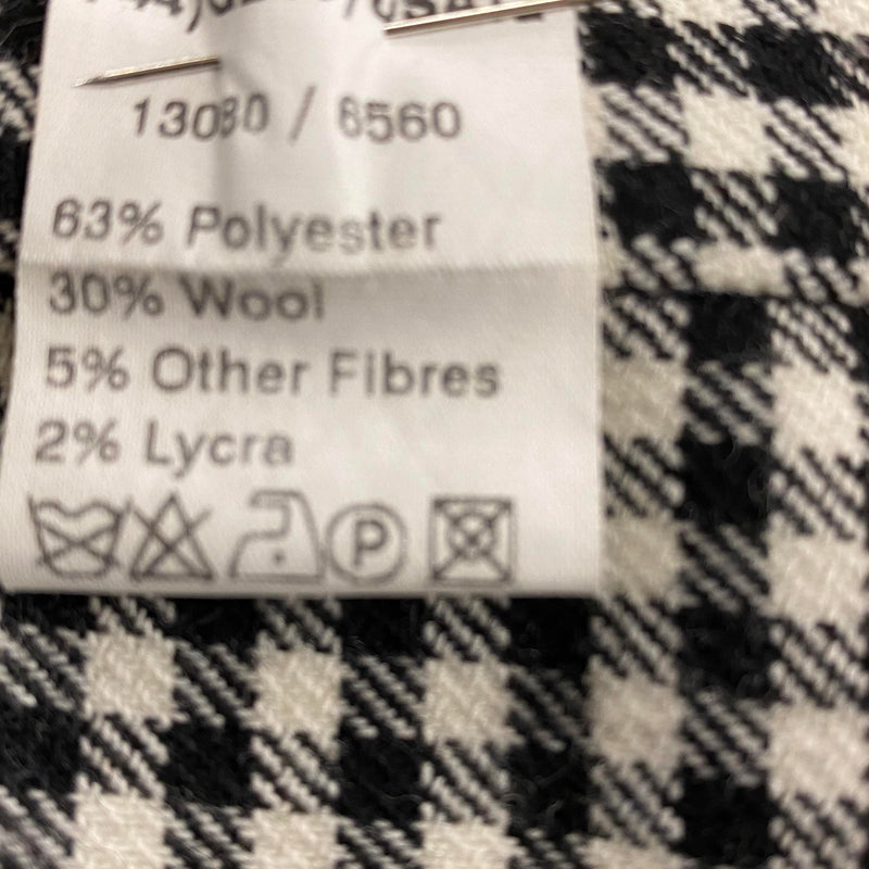 „Materialetikett der Vintage Pepitahose Damen mit Wollanteil und Lycra“