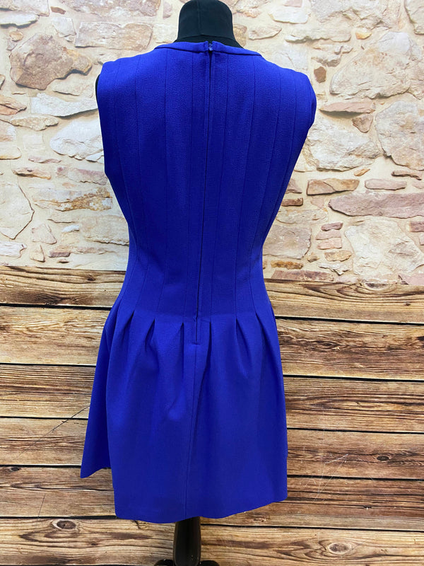 „Rückansicht Vintage Kleid blau mit Reißverschluss und figurbetonter Schnittführung“