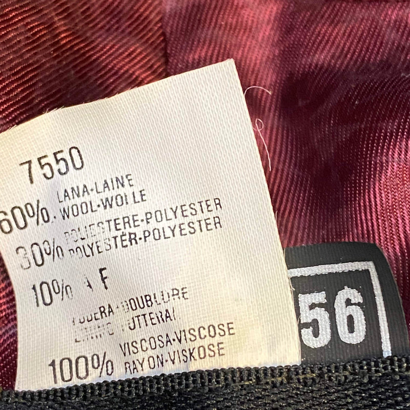 „Materialetikett eines karierten Vintage Herren Huts mit Wollanteil, Polyester und Viskosefutter“