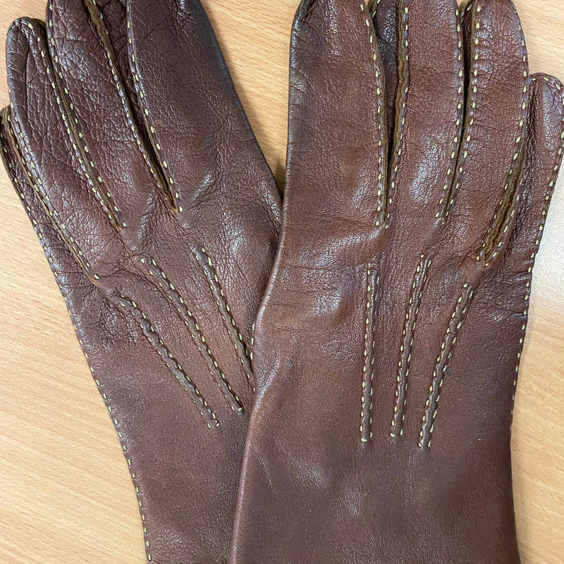 Braune Vintage-Lederhandschuhe mit hellen Kontrastnähten