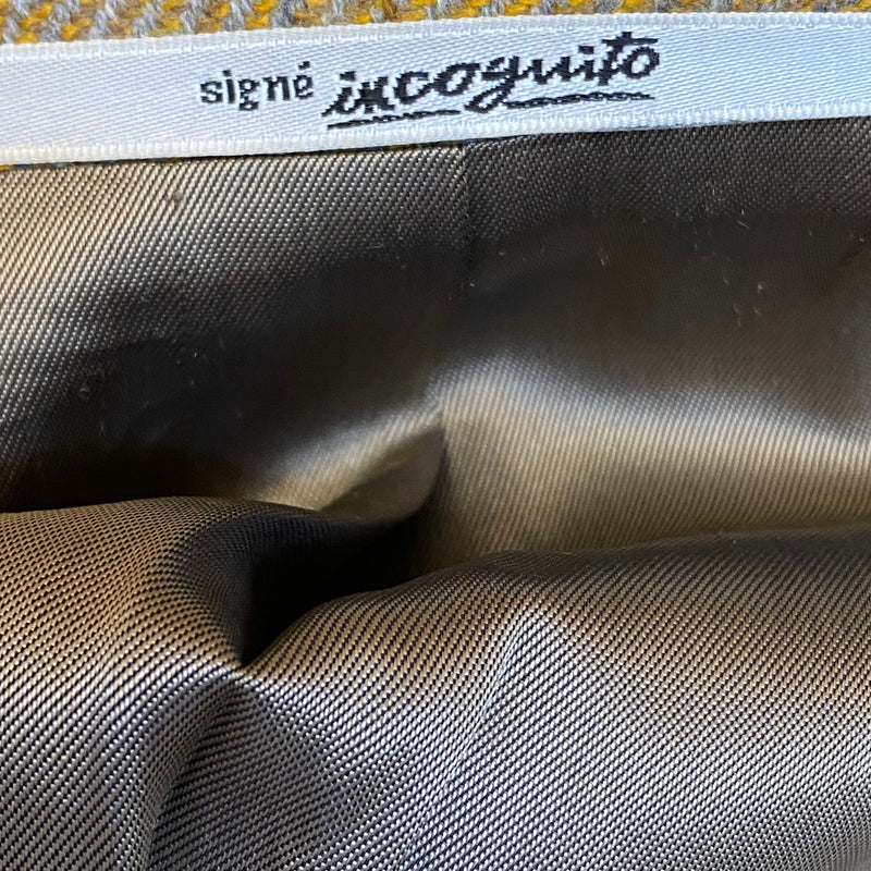 Futteretikett mit Signé Incognito Label.