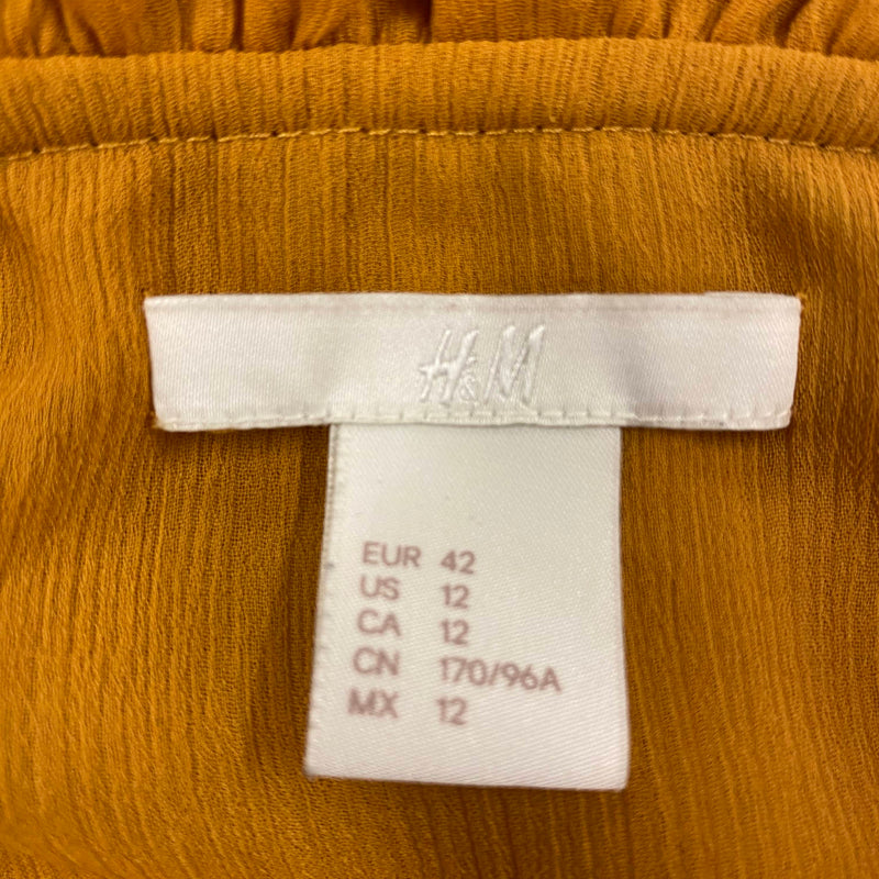 „Detailaufnahme Rüschenkragen Vintage Bluse sonnengelb H&M“