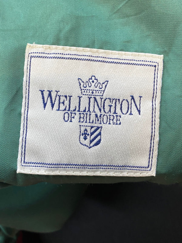 „Markenetikett Wellington of Bilmore im türkisfarbenen Futter des Mantels“
