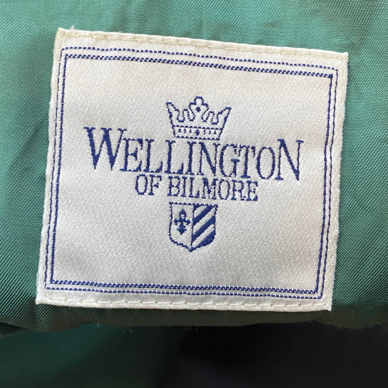„Markenetikett Wellington of Bilmore im türkisfarbenen Futter des Mantels“