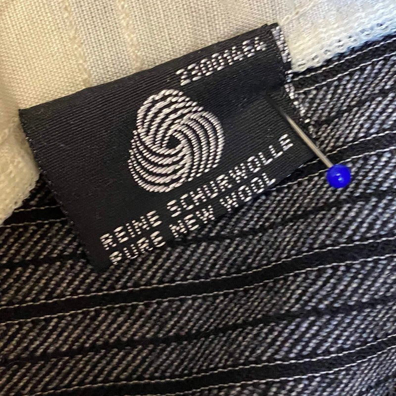 Etikett reine Schurwolle und Pure New Wool