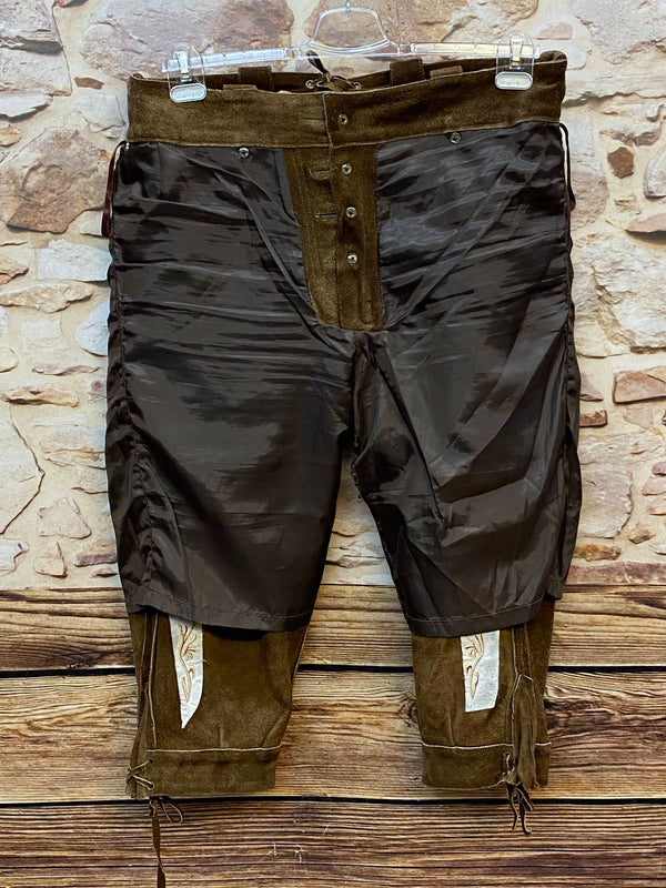 „Innenseite einer hochwertigen Vintage Trachtenlederhose mit braunem Futter und Lederbesatz“