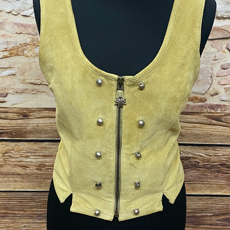Vintage Damen Trachtenmieder aus Echtleder in senffarbenem Beige mit Reißverschluss und Trachtenknöpfen.