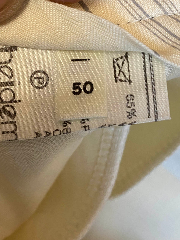 „Größenetikett 50 mit Pflegehinweisen der Vintage Hose“