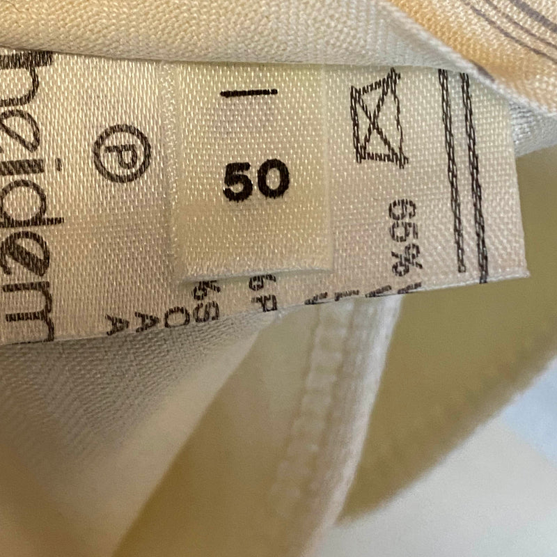 „Größenetikett 50 mit Pflegehinweisen der Vintage Hose“