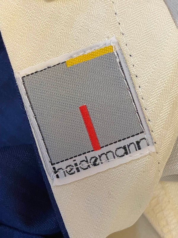 „Heidemann Markenlabel an der dunkelblauen Vintage Herrenhose“