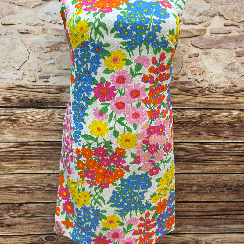 Buntes Vintage Kleid im 70s Blumenmuster – Gr. 50. Original Flower-Power Kleid mit Reißverschluss hinten. Farbintensiv & retro. Ein echtes Unikat im guten Vintagezustand.