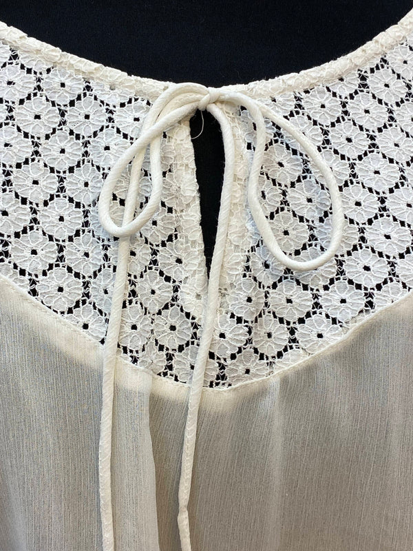 Cremefarbenes Vintage-Oberteil
