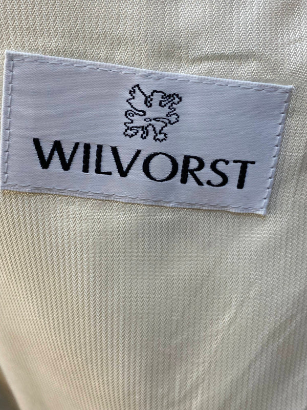 „Wilvorst Markenetikett im cremefarbenen Innenfutter der Vintage-Jacke“