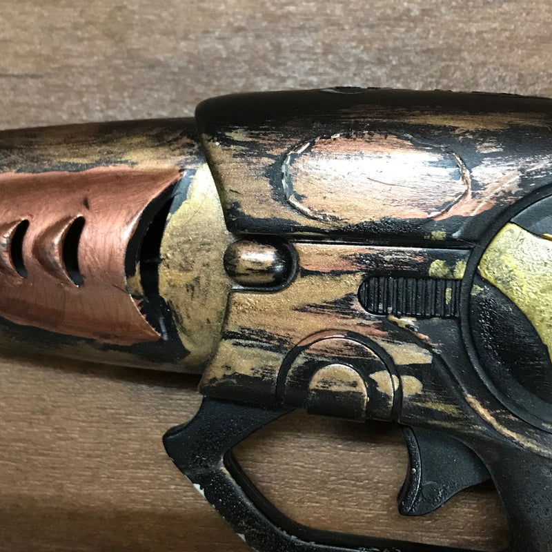 Steampunk-Pistole, schwarz/gold/bronze