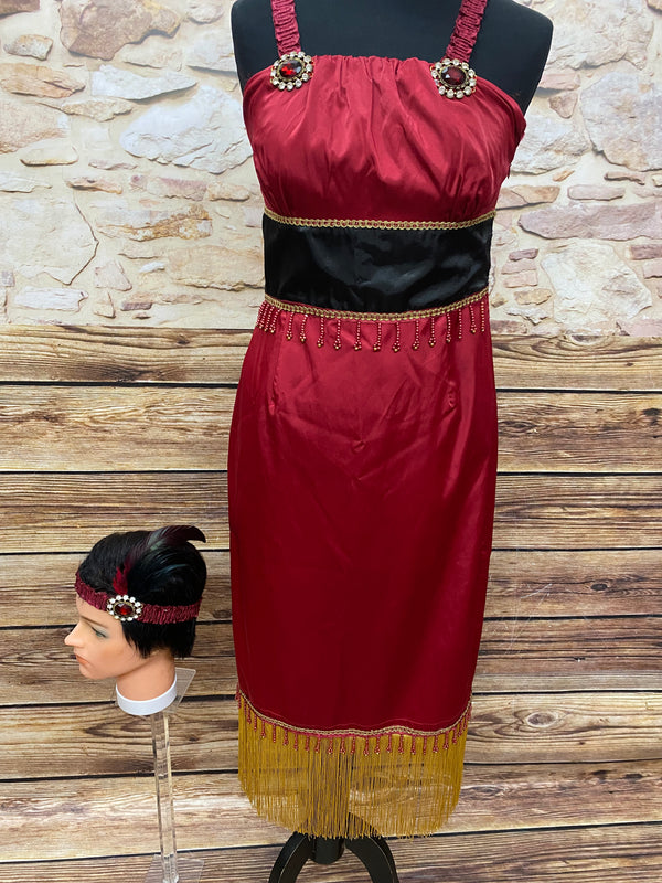 Charleston Kostüm für Damen 3teilig, besteht aus einem rot/schwarzen, ärmellosen Fransenkleid , einem Stirnband und langen roten Handschuhen. Das Kleid ist typisch im 20er Jahre Stil geschnitten und ein Unikat